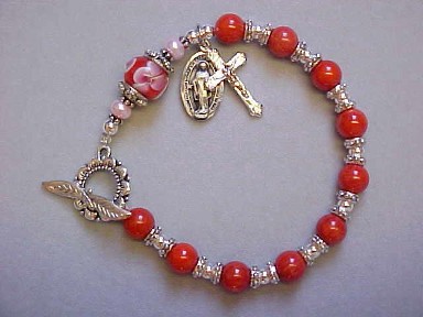 Rosary Bracelet with Red Coral, floral lampwork glass, Silver Plated sunflower clasp with crucifix and miraculous medal dangles