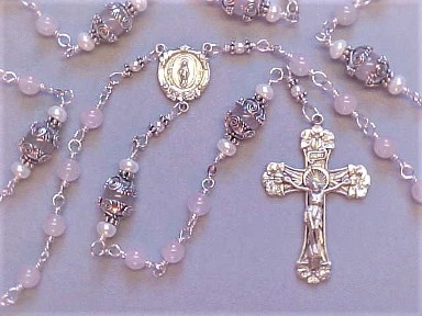 Rose Quartz Rosary with sterling silver crucifix, miraculous medal center, all sterling wire wrapped construction