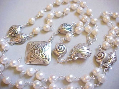 Handmade wire wrapped fresh water pearl  Rosary with Hill Tribes fish and shell beads.