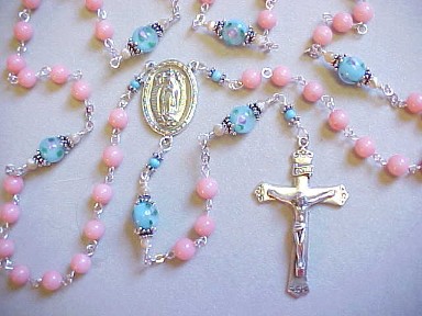 handmade sterling silver Our Lady of Guadalupe rosary with pink coral and lampworked glass