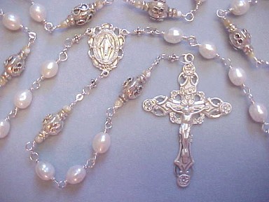 handmade sterling silver wire wrapped rosary with oval freshwater pearls, Bali silver and deluxe sterling silver crucifix and center