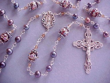 handmade sterling silver wire wrapped rosary with lilac bronze freshwater pearls, lampworked glass and deluxe sterling silver crucifix and center