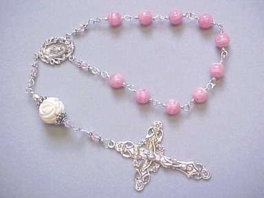hand made one decade rosary with Rhodocrosite gemstone and carved bone, wire wrapped in sterling silver with deluxe sterling silver crucifix and center