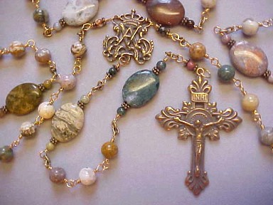 handmade bronze wire wrapped rosary with Ocean Jasper gemstones and hand cast bronze crucifix and center