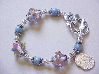 Trinity bracelet with denim lapis and lampworked glass.